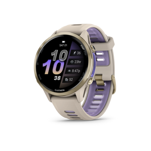 Garmin Forerunner 970 Tytanowy w kolorze Soft Gold z kopertą w kolorze French Grey i półprzezroczystym paskiem w kolorze French grey/Indygo